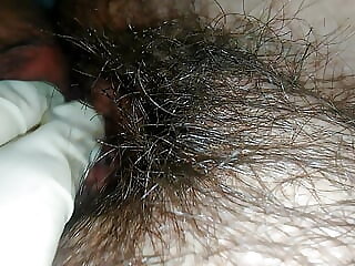 Hairy milf pampers her pussy..
