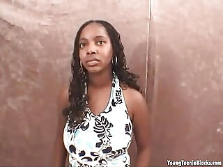 Busty ebony teen sucks on..