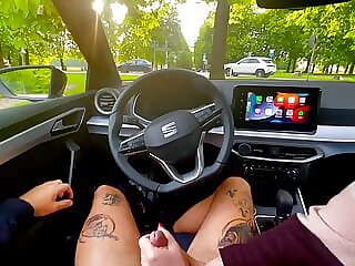 Blond babe gives handjob in..